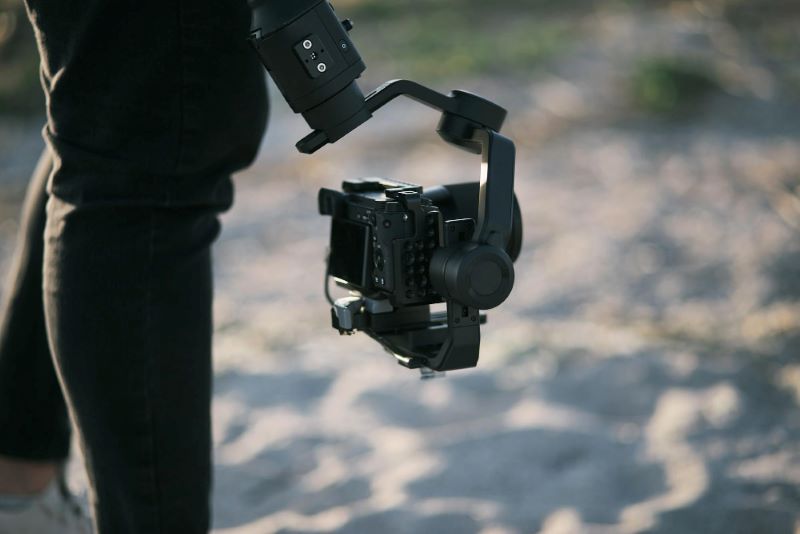 Videographer holding a gimbal